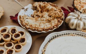 holiday sweets, pies, and goodies on the table