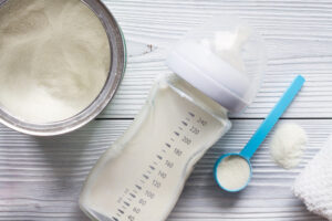 prepping a bottle of baby formula